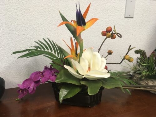 Contact Pacific Silkscapes for BOP, magnolia & orchid arrangement
