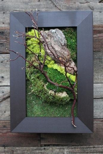 Wood chips, branch and moss wall art