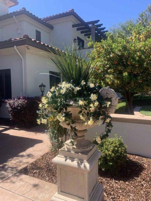 Outdoor faux grasses and White Impatients